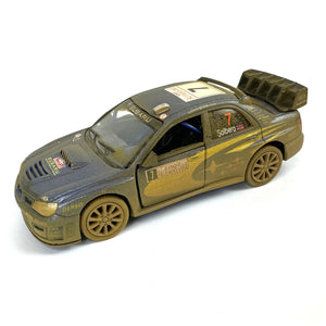 This iconic die cast model Subaru WRC Impreza car has exquisite detail and shows the sponsors and features the W.R.C. World Rally Champion colours. This car measures L 12 cm x W 5 cm x H 4 cm and has opening doors.